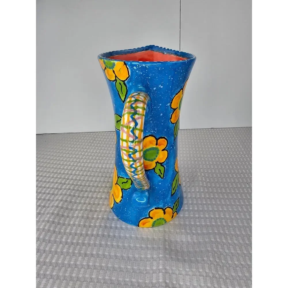 Fusion‎ Pottery Yellow Flower and Blue Pitcher w/handle and Red Finish Inside